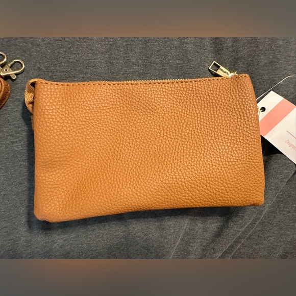 Bnwt crossbody with multiple zipper pockets - Picture 1 of 8